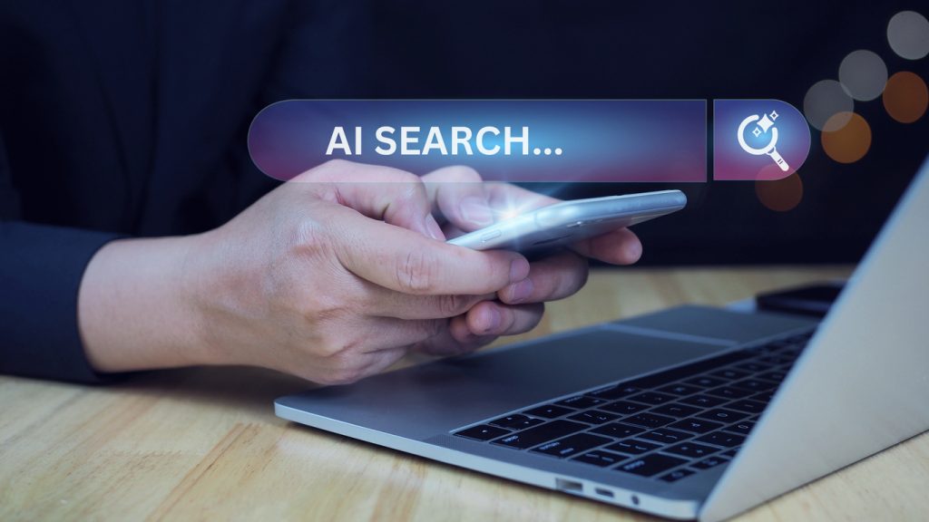 man is doing ai search on mobile and laptop